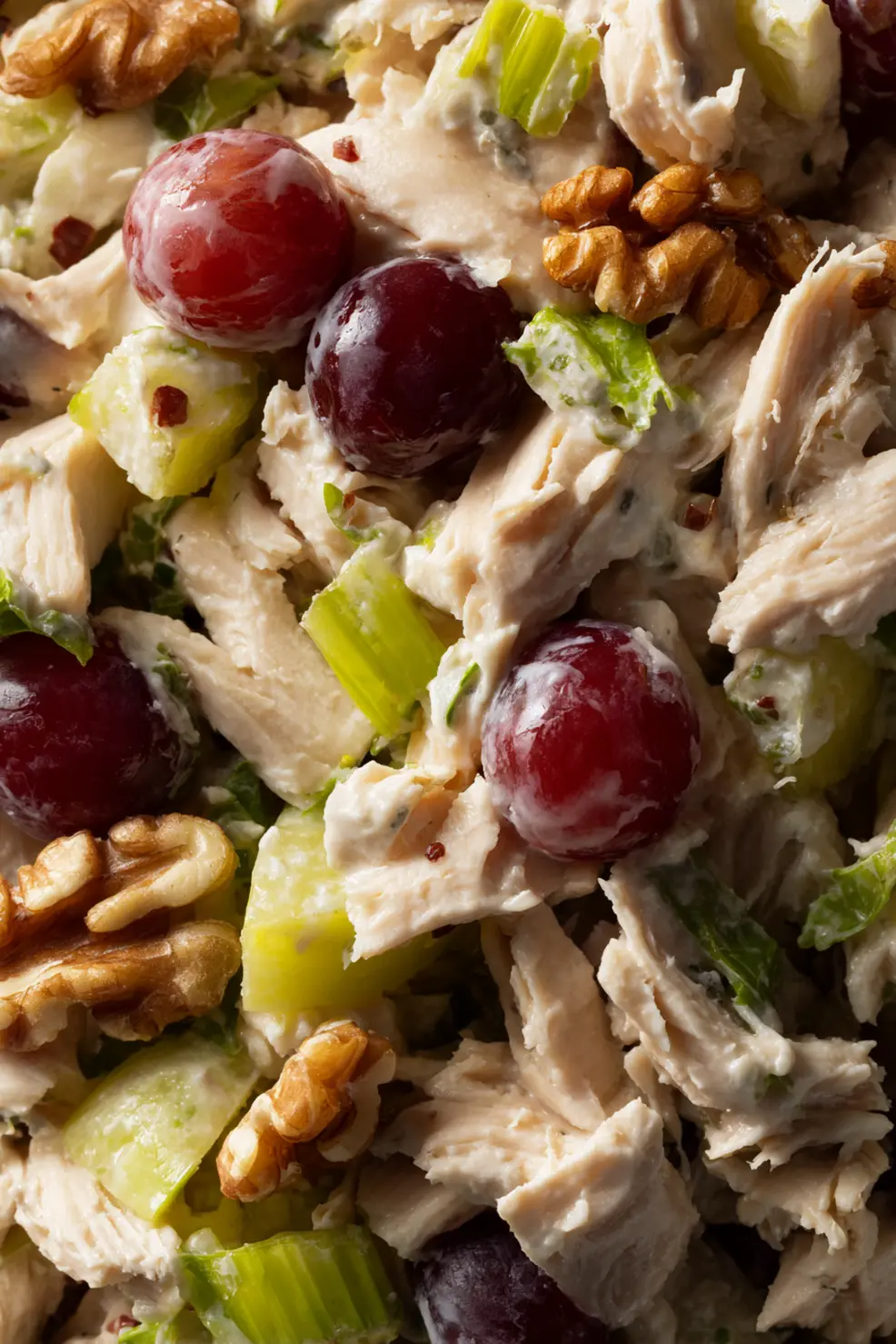 Turkey salad served on a croissant with lettuce