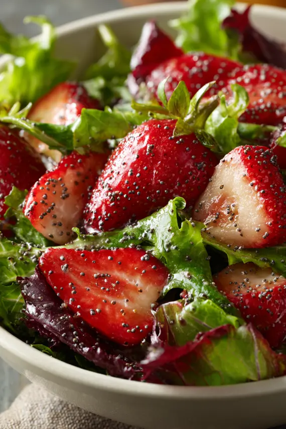 Completed Panera Strawberry Poppyseed Salad served in a white bowl